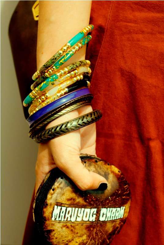 A Girl Wearing Bangles From KATUTUBONG KAMAY HANDICRAFTS Co.